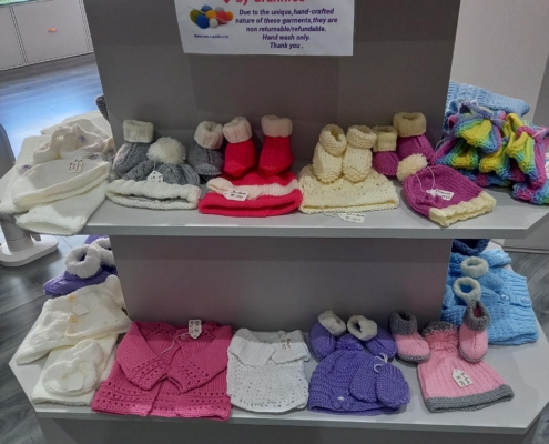 Knitted baby clothes with love by Granny at our baby boutique Sheffield