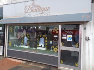 Window display at our baby clothing shop in Woodseats, Sheffield
